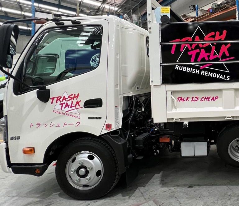 Trash Talk truck door with the logo and katakana