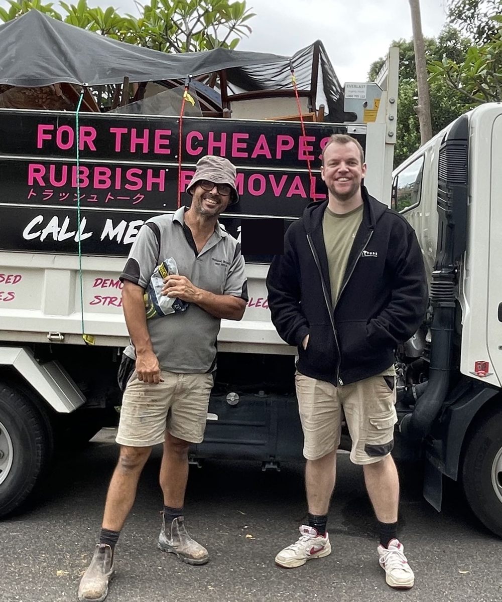 The two Trash Talk guys in front of the truck